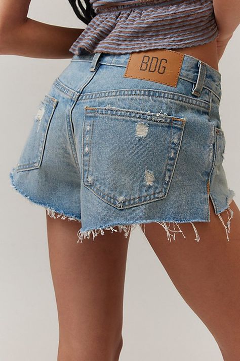 Staple cutoff denim micro shorts from BDG with a low rise. Find them only at Urban Outfitters. Features BDG Lola denim micro shorts Low-rise micro shorts Rigid denim Cutoff hem Micro length Zip fly UO exclusive Content + Care 100% Cotton Machine wash Imported Size + Fit Model in Cream is 5'10" and wearing size 27 Measurements taken from size 27 Inseam: 2" | BDG Lola Denim Micro Short in Light Blue, Women's at Urban Outfitters Low Waisted Shorts, Denim Shorts Outfit Summer, Buy Outfits, Cute Jean Shorts, Low Rise Jean Shorts, Summer Wishlist, Ss 2024, Denim Shorts Outfit, Lovely Princess