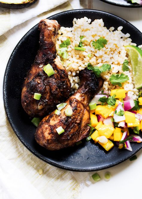 Juicy grilled jerk chicken drumsticks with a delicious Caribbean Rice & sweet mango salsa. The perfect healthy grilling recipe for summertime! Jerk Chicken And Rice, Caribbean Rice, Grilled Jerk Chicken, Caribbean Chicken, Best Chicken Marinade, Healthy Breakfast Bowl, Easy Chicken Marinade, Chicken Marinade Recipes, Grilled Steak Recipes