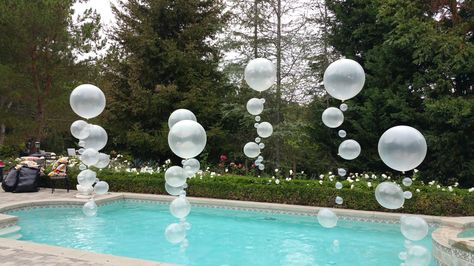 Make a splash by adding some bubbles to your pool for your next summer party!  #poolballoons Floating Pool Decorations, Pool Wedding Decorations, Bubbles Party, Pool Decorations, Pallet Deck Diy, Mermaid Pool Parties, Floating Candles Wedding, Floating Decorations, Pool Wedding