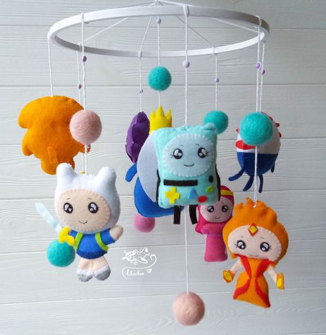 Baby mobile Adventure time lemongrab Music Baby mobile BMO nursery decor Fire princess Ice King Finn Jake crib mobile lumpy space princess by Litachok on Etsy https://www.etsy.com/listing/632050370/baby-mobile-adventure-time-lemongrab Adventure Time Music, Flamingo Nursery Decor, Shower Music, Fire Princess, Flamingo Nursery, Marceline And Princess Bubblegum, Baby Mobile Felt, Lumpy Space, Finn Jake