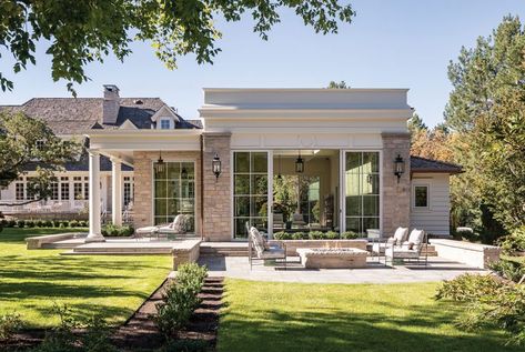 he classically designed pool house replicates the European flair of the main home. Photo by Joshua Caldwell Architecture by Clayton Vance Build by Jackson & Leroy Landscape by Northland Design Group Design by Doran Taylor Inc. Jackson Leroy, Indoor Pool House, Lantern Light Fixture, Utah Style, Stairs In Living Room, Stone Pool, Garden Pavilion, Summer Series, European Architecture