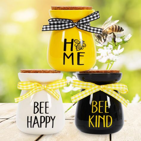 PRICES MAY VARY. Set of 3 - The package comes with 3pcs mini mason jars, they have different designs, perfectly meet your decoration and replacement needs. Bee Design - Classic white, yellow and black colors, printed with letter BEE HAPPY, HOME, BEE KIND, and also have bee pattern, add buffalo plaid ribbon, well match the theme of bee, delicate and inspirational. Mini Size - Each mason jar decoration measures 2.3 x 2.8inch, it is a mini size, won’t take too much space, you can place them anywher Bee Tiered Tray Decor, Bee Tiered Tray, Bumble Bee Decorations, Jar Decoration, Honey Bee Decor, Mini Mason Jars, Bee Day, Buffalo Plaid Ribbon, Bee Pattern