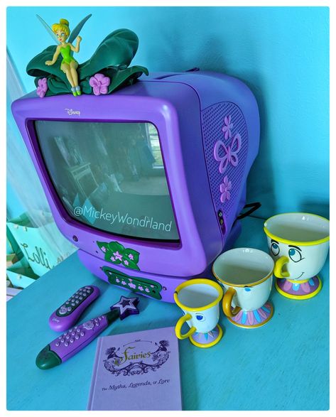 Disney Fairies Tinkerbell TV and DVD player.  Beauty and the Beast Chip cup. Tinkerbell Bedroom, Tinkerbell Room, Babysitting Aesthetic, Tinkerbell Toys, Beauty And The Beast Bedroom, Beauty And The Beast Chip, Fairies Tinkerbell, Disney Box, 2000s Toys