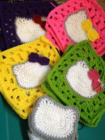 Hello Kitty squares in progress... Hello Kitty Crochet Square, Kawaii Granny Square Crochet, Crochet Hello Kitty Blanket, Hello Kitty Granny Square Pattern, Crochet Hello Kitty Pattern, Hello Kitty Granny Square, Kitty Granny Square, Crochet Cat Granny Square, Hello Kitty Crochet Pattern