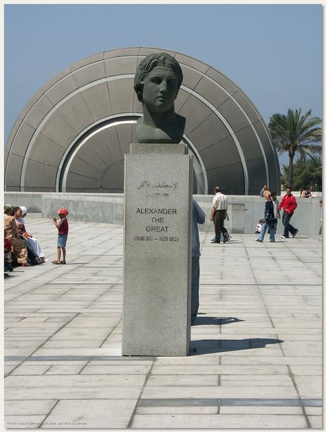 A bust of Alexander the Great on the library grounds The New Library of Alexandria, the New Bibliotheca ‎Alexandrina, is dedicated to recapture the spirit of ‎openness and scholarship of the original Bibliotheca ‎Alexandrina. It is much more than a library.‎ http://gosmarttours.com.eg/en/travelerguide/tourist-attraction-sighseeing/alexandria/library-of-alexandria Library Alexandria, Bibliotheca Alexandrina, Alexandria Library, Ancient Egypt Activities, Ancient Alexandria, Egypt Activities, Alexandria City, Egypt Aesthetic, Y2k Bags