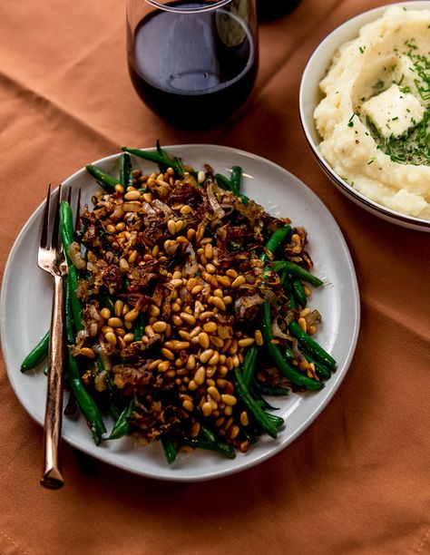 Simply sauteed green beans are dressed up with fried shallots and toasted pine nuts. And the best part, all made in one pan! Shallots And Mushrooms, Green Beans Pine Nuts Shallots, Cherokee Recipes, Green Beans Shallots Garlic, Beef Braciole Recipe, Mushroom Shallot, Roasted Shallots Leeks Butter Beans, Green Beans With Shallots, Savory Bread Pudding