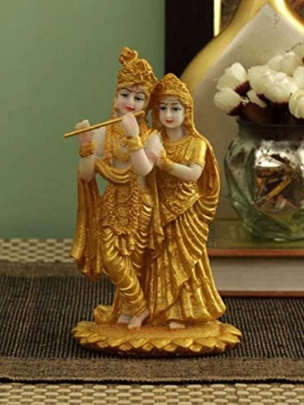 The Radha Krishna is  a symbol of harmony & prosperity. The worship is beneficial for harmony in house & relationships. This poly-resin idol is hand crafted and is suitable for worshipping as well as home decoration. This decorative murti can be used as pooja mandir interior decoration accessories and table decor items or showcase decoration .   #HomeDecor #HomeDecorLo #HomeStore #RadhaKrishna #IdolforGifting Radha Krishna Murti, Radha Krishna Idol, Krishna Murti, Krishna Idol, Diwali Decoration Items, Temple Decor, Interior Decoration Accessories, Krishna Statue, Diwali Gifts