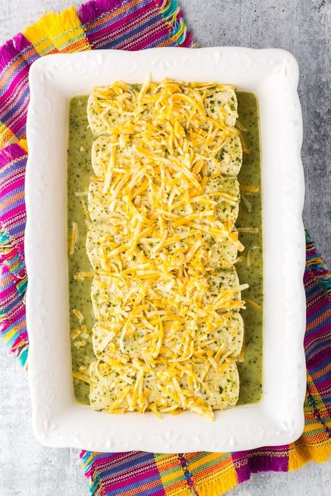 Green Chicken Enchiladas- Green Chicken Enchiladas with Cream Cheese are creamy, cheesy and delicious. These Tex-Mex enchiladas are made with rotisserie chicken and smothered in a homemade green enchilada sauce. This recipe can easily be made ahead for an easy weeknight dinner. #cookingandcussing #enchiladas #texmex #chickendinner chicken green sauce enchilada casserole // Mexican dinner // cream cheese for dinner Green Cream Cheese Enchiladas, Chicken Enchalidas Recipes Green Sauce, Chicken Enchiladas Green Sauce, Chicken Enchiladas With Cream Cheese, Enchiladas With Cream Cheese, Enchiladas Green, Homemade Green Enchilada Sauce, Green Enchilada Recipe, Easy Cheese Enchiladas