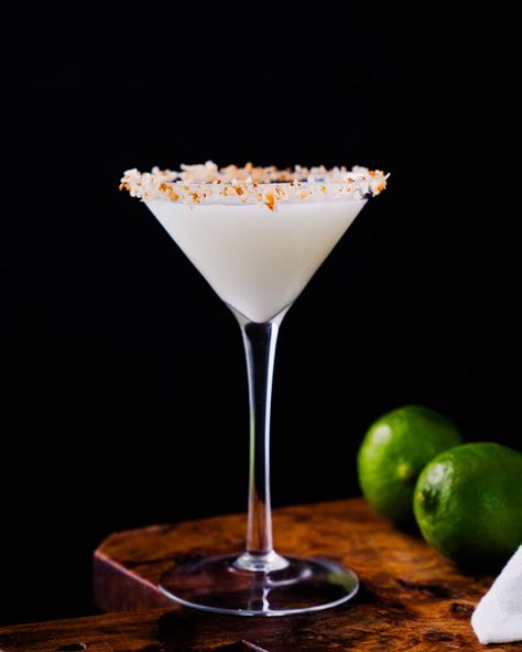 This coconut martini is creamy and dreamy, featuring vodka and lime juice! Add a toasted coconut rim and it's perfection. #coconut #coconutmartini #martinirecipe #easymartini #creamofcoconut #coconutcream #coconutcocktail Coconut Martini, Key Lime Martini, Lemon Martini, Martini Recipes Vodka, Coconut Vodka, Coconut Margarita, Vodka Lime, Coconut Ginger, Lemon Drop Martini