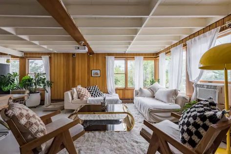 Living room with wood paneling and white sheer curtains White Panelled Walls Living Room, Retro Accent Wall, 50s Home Decor, Wood Paneling Living Room, Double Wide Remodel, 50s Home, 70s House, Beach Living Room, Living Room Photos