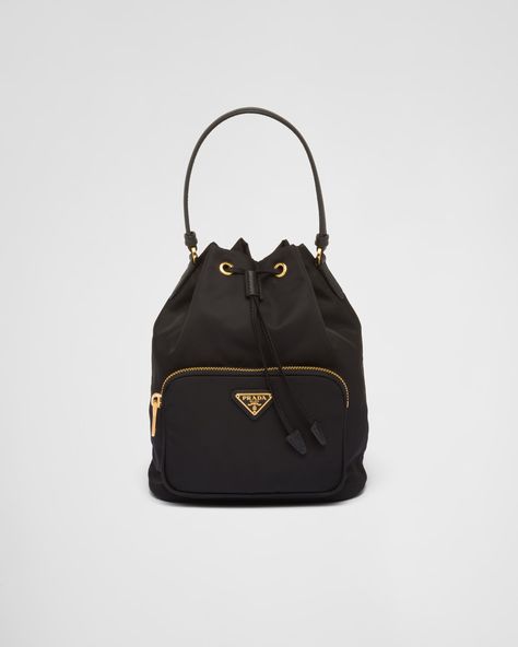 Black Prada Duet Re-nylon Bucket Bag | PRADA Prada Bucket Bag, Prada Nylon Bag, Prada Nylon, Drawstring Bucket Bag, Triangle Logo, Handbag Wallet, Black Shoulder Bag, Wallet Accessories, Nylon Bag