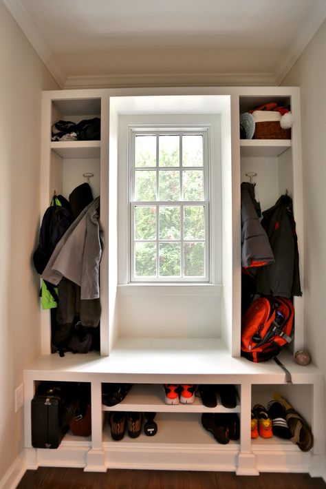 We fit this custom mudroom around a window on a small unused wall in this family's home. Mudroom Around Window, Drop Zone With Window, Mudroom Bench With Window, Small Mudroom Addition Exterior, Small Mudroom Ideas Entryway With Window, Small Mudroom With Window, Mudroom Ideas Entryway With Windows, Mudroom With Window In Middle, Mudroom With Window