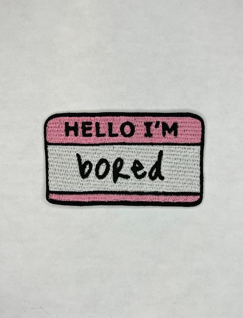 "Hello I'm Bored Embroidered Patch Iron on or sewn on patch for all your DIY needs! Perfect for backpacks or jackets!  * Includes: 1 patch * Single Sided * Approximately: 3.0\" (wide) x 1.8\"  (height)  Patches are made to be iron on. However, to ensure that they last through many wash cycles we suggest that you sew the patch into your garment along the outer edges of the patch." Cute Patches For Backpacks, Cute Patches For Jackets, Senior Jacket Patches, Senior Jackets Patches, Aesthetic Patches, Patch Backpack, Senior Jackets, Hello Sticker, Jacket Patches