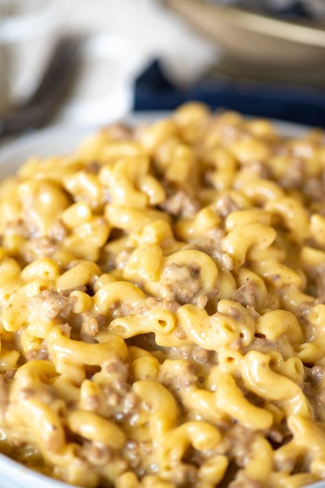 This easy Instant Pot Cheeseburger Mac and Cheese is a homemade version of your favorite boxed meal. Made with a mixture of Velveeta and cheddar cheese, this casserole is sure to become one of your family's new favorite dinners! #gogogogourmet #instantpotcheeseburgermac #cheeseburgermacandcheese #copycatrecipes #easydinnerrecipes #easyinstantpotrecipes Instant Pot Cheeseburger Macaroni, Hamburger Crockpot Recipes, Cheeseburger Mac And Cheese, Cheeseburger Mac, Homemade Cheeseburgers, Homemade Hamburger, Homemade Hamburgers, Hamburger Helper, Cheese Burger