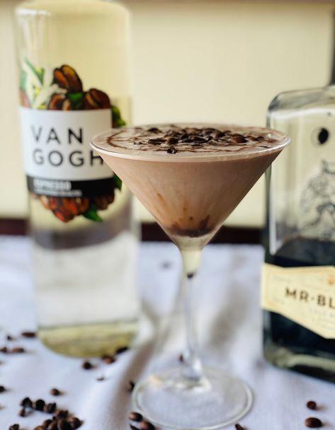 ESPRESSO COLD BREW BLISS 1 1/2 oz Van Gogh Espresso Vodka 1/2 oz Van Gogh Vanilla Vodka 1/2 Mr Black Cold Brew Coffee Liqueur 1 Shot of Espresso Splash of Cream Shake all ingredients over ice for 10 seconds to build a nice froth; strain into a martini glass. Slowly drizzle chocolate syrup over foam so it lays on top of the drink. Top with coffee beans Van Gogh Espresso Martini, Van Gogh Espresso Vodka Recipes, Espresso Drink Recipes, Chocolate Martini Recipe, Rooftop Drinks, Espresso Vodka, Espresso Martini Recipe, Peach Vodka, Shot Of Espresso