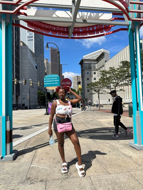 Outfit for a festival ar Underground Atlanta, white crocs sandals, crocs outfit , butterfly top, corset top Crocs Sandals Outfit, Underground Atlanta, Sandals Outfit Summer, Sandals Crocs, Crocs Outfit, White Crocs, Downtown Atlanta, Crocs Fashion, Crocs Sandals