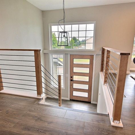 Split Entry Stairs Remodel, Split Foyer Remodel Interior, Entryway Railing Ideas, Split Foyer Living Room Ideas, California Split Level Remodel, Split Entry Kitchen Remodel Open Floor, Split Level Entryway Remodel, Split Entry Remodel Entryway, Bilevel House Interior Design