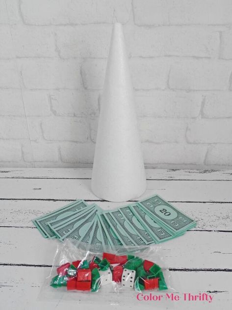 Monopoly Christmas Tree, Board Game Christmas Tree, Monopoly Crafts, Christmas Monopoly, Money Christmas Tree, Rosette Ornaments, Monopoly Pieces, Monopoly Money, Reindeer Games