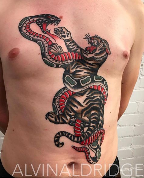 Very cool version of the tiger and snake from the cover of the Sailor Vern book by @alvin_aldridge ! #tattoohistory #traditionaltattoos Tyson Tattoo, Traditional Back Tattoo, Eagle Snake, Tummy Tattoo, Full Chest Tattoos, Chest Tattoo Ideas, Tatuagem Masculina Pequena, Cool Chest Tattoos, Eagle Tattoos