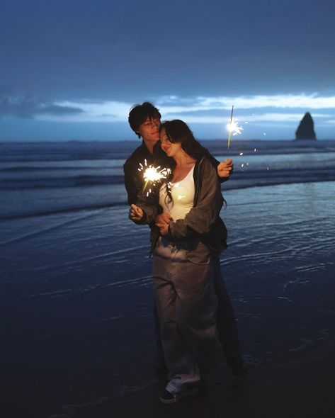 late nights at the beach retreat: @createdtocreateretreats portland oregon photographer, oregon coast, cannon beach, sparklers, night session, young love, off camera lights, engagement photos, portland models Beach Sparklers, Engagement Photos Night, Moon To My Sun, Partner Vision Board, Sparkler Photos, Nights At The Beach, Couple Beach Pictures, Camera Lights, Fireworks Photo