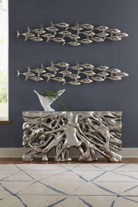 The Silver School of Fish by Phillips Collection is a piece of dimensional wall decor in a silver leaf finish that is shaped like a school of fish. Root Console Table, Silver Console Table, Wall Art Silver, Dimensional Wall Decor, School Of Fish, Fish Wall Decor, Square Roots, Dimensional Wall, Fish Wall Art