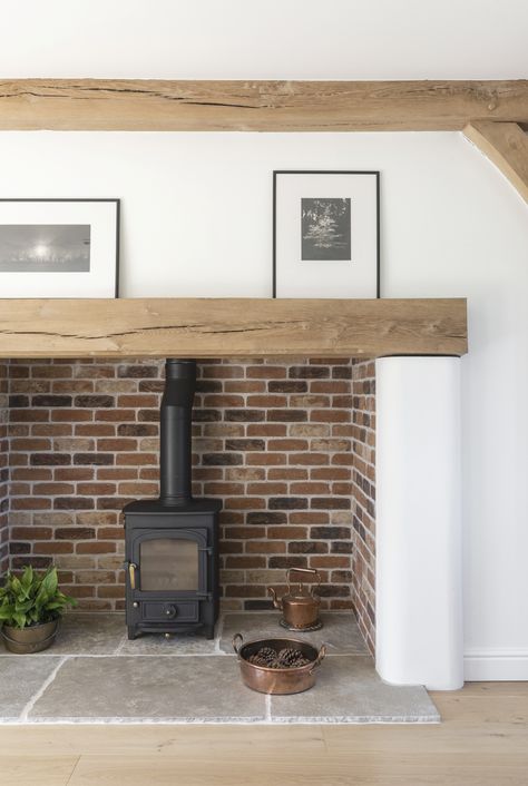 Brick Fireplace In Kitchen, Kitchen With Log Burner, Cottage Log Burner, Brickslip Fireplace, Wood Burning Stove Mantle Ideas, Farmhouse Wood Burning Stove, Wood Stove Alcove Ideas, Wood Stove Alcove, Wood Burning Stove In Fireplace