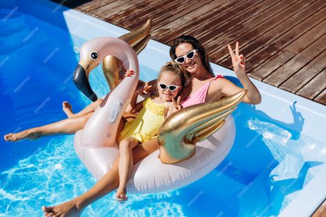 Premium Photo | Young mother and her daughter having fun at pool Mother And Her Daughter, Pool Picture, Girls Holiday, Summer Photoshoot, Kid Pool, Pool Photos, Mom Daughter, Mom Kid, Cool Pools