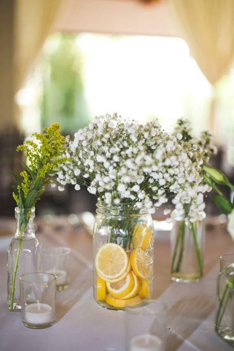 These Mason Jar Wedding DIY Projects Are Perfectly Rustic – Makeful Lemon Table Decor, Lemon Centerpieces, Lemon Themed Bridal Shower, Unique Wedding Flowers, Wedding Floral Centerpieces, Mason Jar Wedding, Mason Jar Centerpieces, Wedding Centerpieces Diy, Wedding Table Decorations