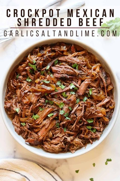 Crockpot Mexican shredded beef is super easy to make and takes only 15 minutes of hands on time to prepare! Plus, it's extremely versatile and freezer friendly so you can make it in bulk and store for months. This comes in handy when you need a quick, easy dinner. Use your pulled beef to make tacos, nachos, quesadillas, burritos, burrito bowls, enchiladas, taco salad and more! It's even gluten free, dairy free, low carb and high protein. Pulled Beef Tacos Crockpot, Shredded Beef Tacos Crockpot, Slow Cooker Mexican Shredded Beef, Beef Crockpot Recipes, High Protein Dinner Recipes, Crockpot Beef Tacos, Crockpot Shredded Beef, Shredded Beef Recipe, Crockpot Mexican