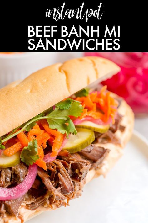 Banh Mi Sandwiches with pork are great, but have you had them with beef?! This recipe for Beef Banh Mi Sandwiches is made with beef chuck roast and can be made in the slow cooker or Instant Pot. Topped with quick pickled veggies and Sriracha mayo and served on a bun. Instant Pot Greens, Beef Banh Mi, Quick Pickled Veggies, Vietnamese Sandwich, Banh Mi Sandwich, Clean Eating Salads, On A Bun, Quick Pickled, Recipes Authentic