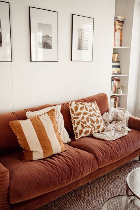 Courdoroy Couch, Terracota Sofa Living Room Ideas, Terra Cotta Couch, Rust Orange Couch, Terracotta Sofa Living Rooms, Rust Sofa Living Room, Rust Couch, Terracotta Sofa, Orange Couch