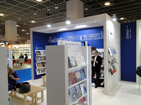 Exhibition Design 12th International book fair of Thessaloniki on Behance Book Fair Booth Design, Book Stall Design, Book Fair Exhibition Stand Design, Bookfair Poster, Scholastic Book Fair Set Up, Signage Exhibition, Frankfurt Book Fair, Book Fair Nostalgia, Book Exhibition