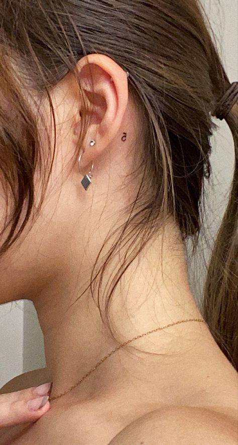 Minimalist Kiss Tattoo, Small Number Tattoo Behind Ear, Simple Behind Ear Tattoo, Small Matching Tattoos Behind Ear, Number Tattoos Behind The Ear, Behind Ear Fine Line Tattoo, Horseshoe Tattoo Behind Ear, Behind The Ear Letter Tattoo, Tattoo Behind Ear Number