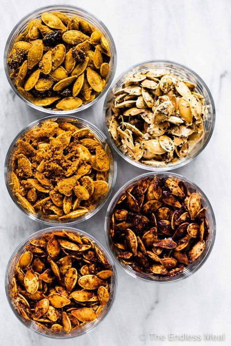 PIN TO SAVE FOR LATER! Roasted pumpkin seeds are the best part about carving a pumpkin. Cooking pumpkin seeds is incredibly easy and they turn out crispy and delicious every time with our recipe. Bonus: we share our 5 favorite pumpkin seed seasonings! #theendlessmeal #pumpkinseeds #pumpkin #roastedpumpkinseeds #bakedpumpkinseeds #carvingapumpkin #healthysnack #snacks #snackrecipes #pumpkinrecipes #fall #fallsnack #halloween #halloweenrecipe #healthyhalloween Seasoned Pumpkin Seeds, Pumpkin Cooking, Cooking Pumpkin Seeds, Carving A Pumpkin, Pumpkin Seed Recipes, Cooking Pumpkin, Seasonal Salad, Fall Snacks, Roasted Pumpkin