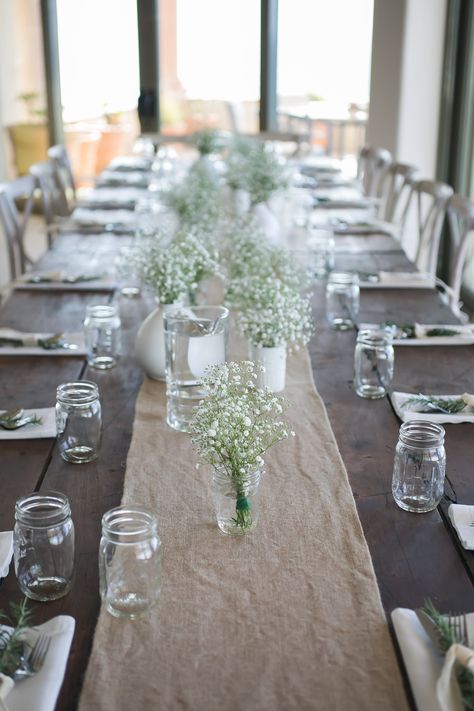 wood tables with baby's breath flowers, mason jars, white linen napkins.  photo by http://anaandjerome.com Simple Guest Table Wedding, Wedding Table Decorations Baby Breath, Babys Breath Wedding Tables, Babybreath Table Decoration Wedding, Beckham Wedding, Fall Bridal Shower Decorations, Round Table Centerpieces, Flower Jars, Baby Shower Neutral