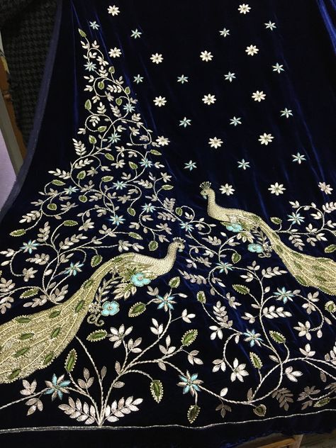 Hand embroidery of peacock motif done on pure micro velvet..for booking watsapp at 8127066666 Peacock Suit Design, Peacock Embroidery Designs On Suits, Peacock Hand Embroidery Designs, Peacock Suit, Simple Suit Designs, Lengha Design, Embroidery Hacks, Velvet Shawls, Bridal Embroidery