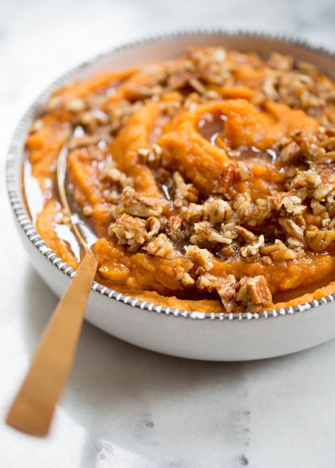 Sweet potatoes simmered in coconut milk until tender, whipped until smooth, and topped with a warm maple syrup and pecan mixture. Dairy-free and delicious! #veganthanksgiving #veganthanksgivingsides #sweetpotatoes #dairyfreethanksgiving Whipped Sweet Potatoes, Sweet Potato Pecan, Slow Cooker Sweet Potatoes, Sweet Potato Recipes Casserole, Crockpot Cooking, Delicious Thanksgiving, Baked Treats, Thanksgiving Side, Vegan Thanksgiving