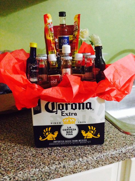 21st birthday gift for guys Liquor Baskets, Diy Alcohol Gifts, 21st Birthday Gifts For Guys, Birthday Gifts For Guys, Drink Tower, 21st Birthday Gifts For Boyfriend, Guy Presents, Diy 21st Birthday Gifts, 21st Birthday Basket