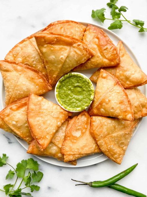 Potato Samosa Recipe-Easy Aloo Samosa - Feast with Safiya Potato Samosa Recipe, Potato Samosa, Aloo Samosa, Uncooked Tortillas, Potatoes And Peas, Cilantro Chutney, Samosa Recipe, Supermarket Design, Best Appetizer