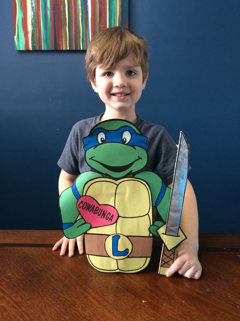 Lyrics TMNT Valentine box for school this year. Made it out of a protein container. Ninja Turtle Valentines Boxes, Ninja Turtles Valentines Day Boxes, Ninja Turtle Valentine Box Ideas, Sonic Valentines, Blue Ninja Turtle, Vday Crafts, Valentine Boxes For School, Diy Valentines Box, Class Treats