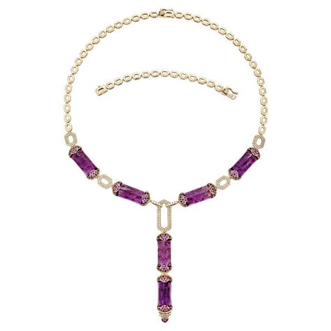 Glamorous Gemstones - Sunita Nahata started off her career as a gemstone trader, and this particular collection reflects her love for multi-colored semi-precious gemstones. The pieces in this collection are exclusively curated by Sunita to present unique items that incorporate fancy and exclusive gemstones cuts and color combinations. Amethyst necklace in 18Karat Rose Gold with Pink Sapphire and White Diamond. Amethyst: 88.19 carat, 20X10mm size, baguette shape. Amethyst: 1.27 carat, 1.50mm size, round shape. Pink Sapphire: 0.81 carat, 1.50mm size, Round Shape. White Diamond: 0.13 carat, 1.50mm size, round shape, G color, VS clarity. White Diamond: 0.08 carat, 1.30mm size, round shape, G color, VS clarity. White Diamond: 0.99 carat, 1.00mm size, round shape, G color, VS clarity. Gold: 61.8 Purple Sapphire Necklace, Purple Sapphire, Sapphire Necklace, Amethyst Necklace, Unique Items, Precious Gemstones, Cut And Color, Pink Sapphire, 18k Rose Gold