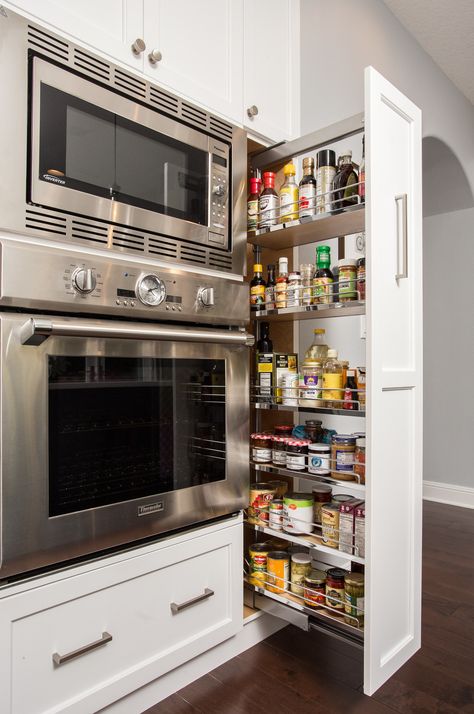 A vertical pull-out rack is genius kitchen storage solution for spices, sauces, and oils Kitchen Renovation Inspiration, Just Tired, Kitchen Remodel Design, Kitchen Remodel Ideas, Kitchen Remodel Before And After, Kitchen Room Design, Kitchen Inspiration Design, Kitchen Redo, Kitchen Remodeling Projects