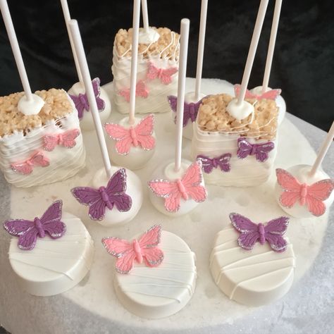 Butterfly cakepops, rice Krispy treats, & chocolate covered Oreos. Rice Krispie Treats Butterfly Theme, Butterfly Cakepops Ideas, Purple Butterfly Centerpieces Quinceanera, Butterfly Treats Sweets, Butterfly Oreos, Butterfly Rice Krispie Treats, Butterfly Baptism Theme, Butterfly Baby Shower Treats, Butterfly Birthday Ideas