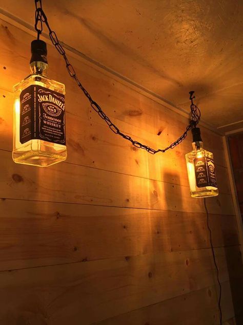 Jack Daniels chandelier Jack Daniels Lampe, Bar Lighting Ideas, Jack Daniels Lamp, Jack Daniels Bottle, Liquor Bottle Crafts, Wood Light Fixture, Man Cave Home Bar, Home Bar Designs, Bottle Lamp