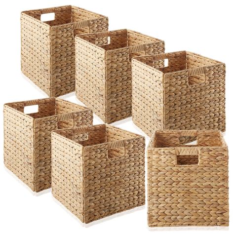 PRICES MAY VARY. Set of 6 storage cubes: Includes six water hyacinth folding storage cube baskets. Each cube measures 12" W x 12" D x 12" H and is designed to fit most cube storage shelving units and cubby organizers. These storage baskets feature a sturdy metal frame and are built to last. Due to the handmade nature of these products, each piece is unique; please allow for slight variation in measurements. Handwoven baskets: Water hyacinth storage cubes, or utility baskets, offer a stylish and Cube Organizer Bins, Cube Shelving Unit, Laundry Pantry, Collapsible Storage Cubes, Cubby Organizer, Pantry Shelves, Laundry Basket Organization, Bedroom Laundry, Cube Organizer