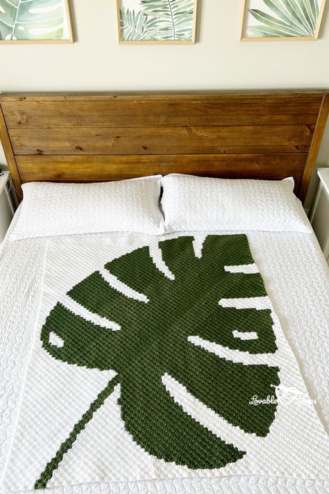 Lovable Loops free c2c crochet monstera leaf blanket pattern Monstera Leaf Blanket, Crochet Plants Free Pattern Monstera, Graphghans Crochet Patterns, Leaf Blanket Pattern, Crochet Monstera Leaf Free Pattern, Monstera Blanket, Crochet Monstera Leaf, Monstera Crochet, Plant Blanket