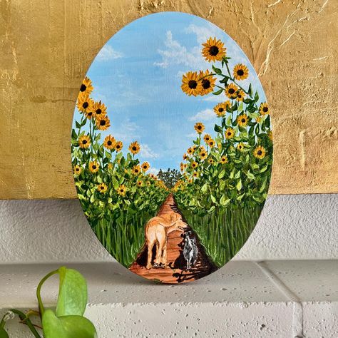 Mondays are for pet portraits with your client’s favorite neighborhood sunflower field as the background🌻☀️ I was so excited to paint this pair of besties! My client took this photo of her dog and cat walking side by side (literally) into the sunset, and knew she wanted to capture this memory forever in a painting! She requested that the painting be set in their favorite field of sunflowers instead of her backyard, adding another layer of sentiment to this piece💛 I suggested that an oval s... Pair Canvas Painting Ideas, Oval Canvas Painting Ideas, Oval Canvas Painting, Walking Side By Side, Cat Walking, Field Of Sunflowers, Canvas Painting Ideas, Sunflower Field, Canvas Ideas