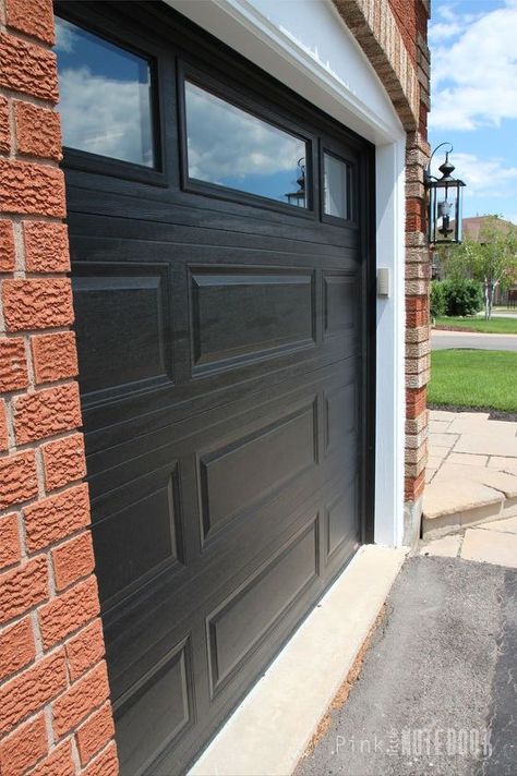 Did you know garage doors can account for almost 40% of your home’s facade? That’s a pretty large percentage, right! That means with just new garage doors alone, you can dramatically change the look and feel of your home.Well, I can’t wait to show you what we did! We’re finally getting into the fun part of this outdoor project. I’m going to show you how we switched out the old garage doors for our new and improved GARAGA doors.Let’s begin with the garage door trim (also known as the jambs). ... Cottages Exterior, Black Garage Door, Garage Door Trim, Black Garage Doors, Painting Doors, Faux Wood Garage Door, Garage Door Colors, Garage Door House, Black Garage