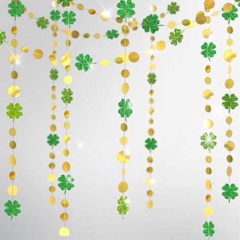 PRICES MAY VARY. 4 strings of 13 ft green glitter four-leaf clover and gold circle garlands, totally 52 ft. Each clover is 3.2 inch wide This glittering paper shamrock streamer kit is specifically designed for the Irish St. Patrick’s Day or any spring celebrations. It combines the beautiful natural green and the glamorous gold colors together and brings about a lively, cheerful and prosperous ambience at home or parties The four leaf garlands are perfect for St Patrick's Day celebration or any S Sant Patrick, Irish Party, Streamer Backdrop, Circle Garland, Irish Baby, Spring Birthday, Green Garland, St Patrick's Day Decorations, Spring Celebration