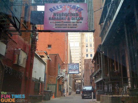 Nashville's famed Printers Alley is so named because of the large number of printing companies that used to be housed in that alley. Today, Printer's Alley is a Nashville hot spot for tourists and locals alike. Here's why... Knockturn Alley, Knock Turn Alley, Santee Alley, Nashville Broadway Street, Printers Alley Nashville, Nashville Vacation, Nashville Hot, Nashville Trip, Nashville Tn